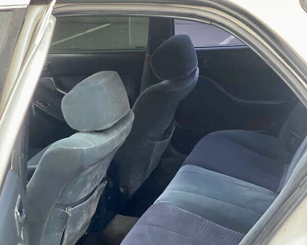 Белый Тойота Камри, объемом двигателя 2.16 л и пробегом 300 тыс. км за 2250 $, фото 11 на Automoto.ua