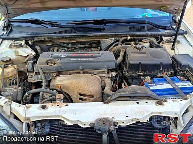 Білий Тойота Камрі, об'ємом двигуна 2.4 л та пробігом 255 тис. км за 5300 $, фото 7 на Automoto.ua