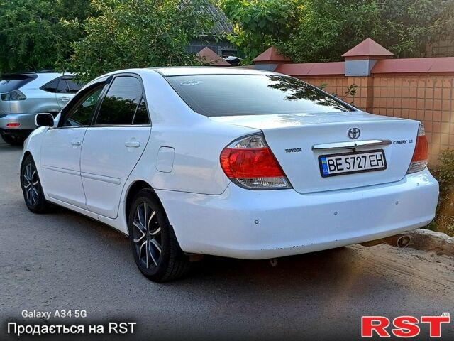 Білий Тойота Камрі, об'ємом двигуна 2.4 л та пробігом 255 тис. км за 5300 $, фото 3 на Automoto.ua