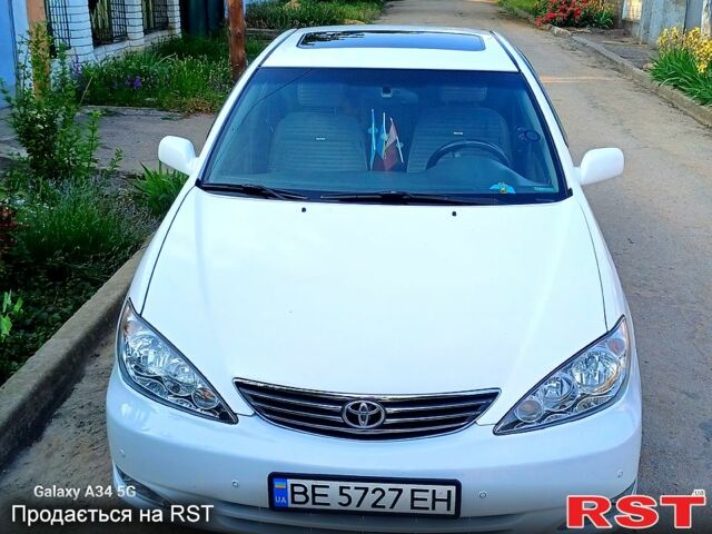 Білий Тойота Камрі, об'ємом двигуна 2.4 л та пробігом 255 тис. км за 5300 $, фото 5 на Automoto.ua