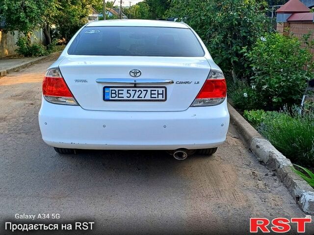 Білий Тойота Камрі, об'ємом двигуна 2.4 л та пробігом 255 тис. км за 5300 $, фото 4 на Automoto.ua