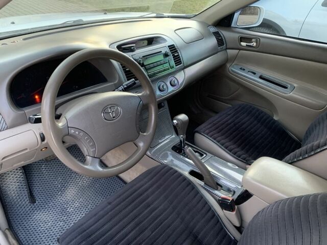 Белый Тойота Камри, объемом двигателя 2.4 л и пробегом 325 тыс. км за 5500 $, фото 9 на Automoto.ua