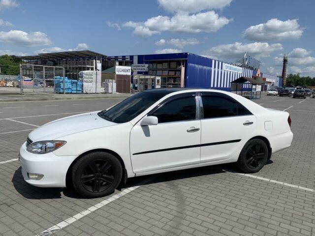 Белый Тойота Камри, объемом двигателя 2.4 л и пробегом 325 тыс. км за 5500 $, фото 7 на Automoto.ua