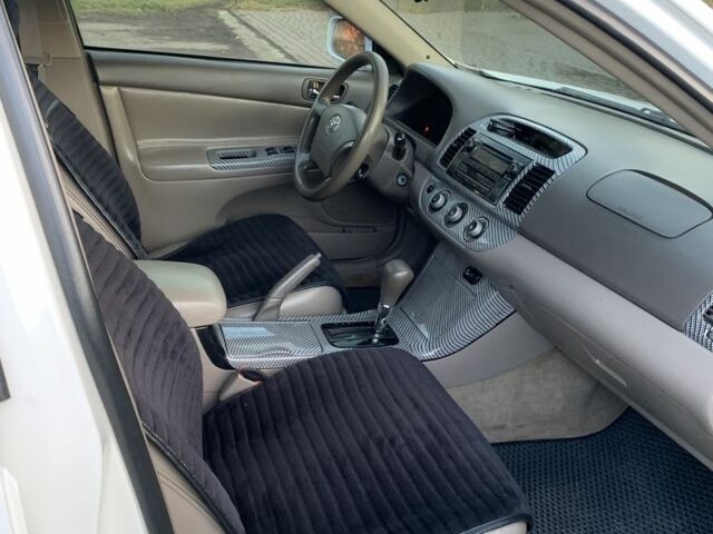 Белый Тойота Камри, объемом двигателя 2.4 л и пробегом 325 тыс. км за 5500 $, фото 13 на Automoto.ua