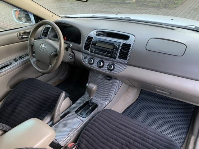 Белый Тойота Камри, объемом двигателя 2.4 л и пробегом 325 тыс. км за 5500 $, фото 11 на Automoto.ua