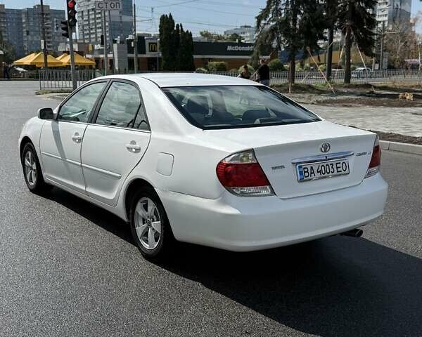 Білий Тойота Камрі, об'ємом двигуна 2.36 л та пробігом 268 тис. км за 4650 $, фото 5 на Automoto.ua