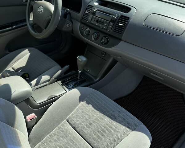 Білий Тойота Камрі, об'ємом двигуна 2.36 л та пробігом 268 тис. км за 4650 $, фото 14 на Automoto.ua