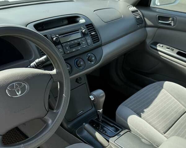 Білий Тойота Камрі, об'ємом двигуна 2.36 л та пробігом 268 тис. км за 4650 $, фото 7 на Automoto.ua