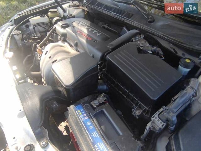 Белый Тойота Камри, объемом двигателя 2.4 л и пробегом 285 тыс. км за 6900 $, фото 6 на Automoto.ua