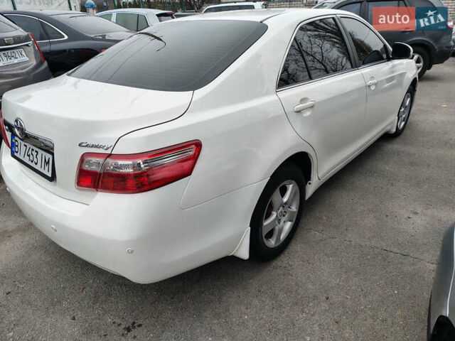 Белый Тойота Камри, объемом двигателя 2.4 л и пробегом 197 тыс. км за 9900 $, фото 9 на Automoto.ua