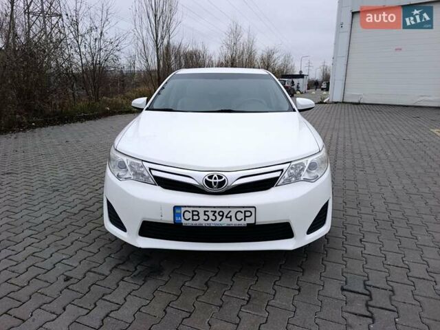 Белый Тойота Камри, объемом двигателя 2.49 л и пробегом 174 тыс. км за 9700 $, фото 2 на Automoto.ua