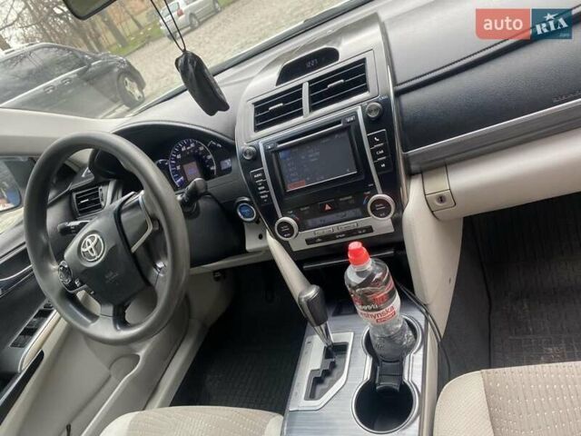 Белый Тойота Камри, объемом двигателя 2.49 л и пробегом 135 тыс. км за 9300 $, фото 11 на Automoto.ua