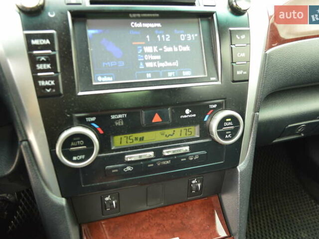 Белый Тойота Камри, объемом двигателя 2.5 л и пробегом 242 тыс. км за 13700 $, фото 19 на Automoto.ua