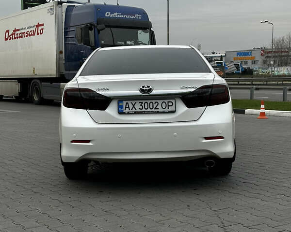 Білий Тойота Камрі, об'ємом двигуна 2.49 л та пробігом 233 тис. км за 12700 $, фото 4 на Automoto.ua