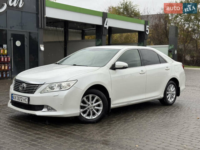 Белый Тойота Камри, объемом двигателя 2.5 л и пробегом 152 тыс. км за 12700 $, фото 13 на Automoto.ua