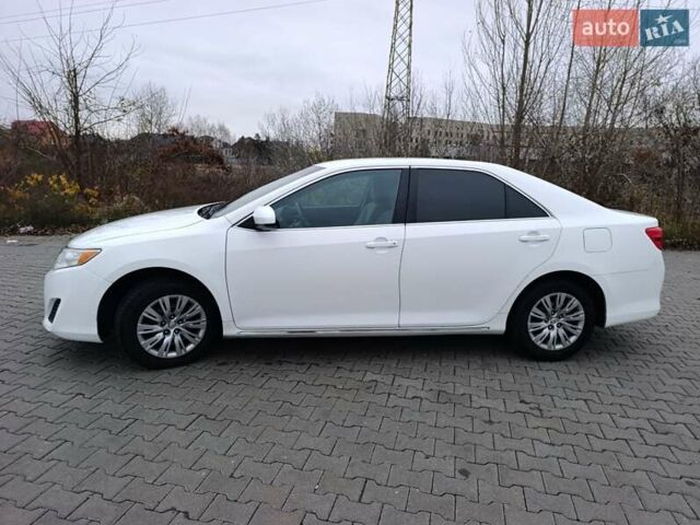Белый Тойота Камри, объемом двигателя 2.49 л и пробегом 174 тыс. км за 9700 $, фото 6 на Automoto.ua