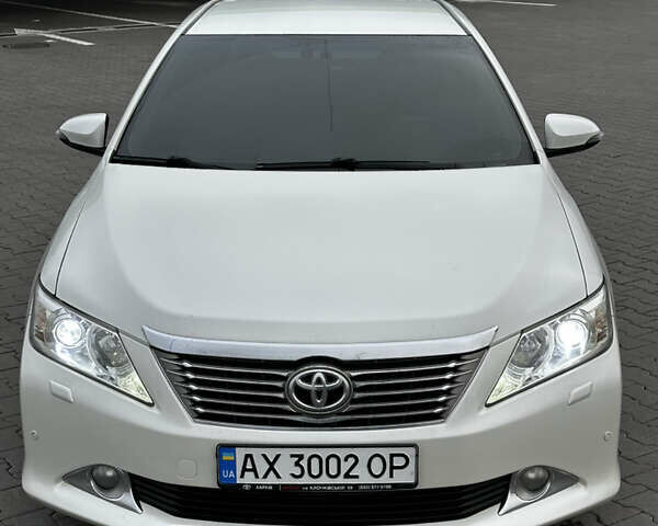 Білий Тойота Камрі, об'ємом двигуна 2.49 л та пробігом 233 тис. км за 12700 $, фото 12 на Automoto.ua