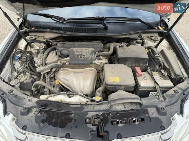 Белый Тойота Камри, объемом двигателя 2.5 л и пробегом 242 тыс. км за 13700 $, фото 24 на Automoto.ua