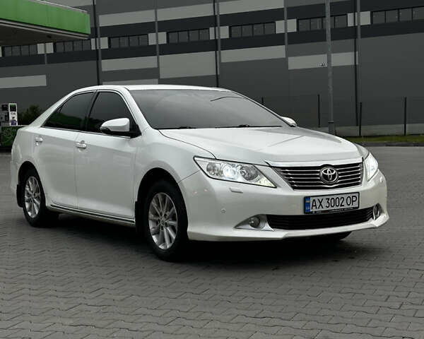 Білий Тойота Камрі, об'ємом двигуна 2.49 л та пробігом 233 тис. км за 12700 $, фото 14 на Automoto.ua