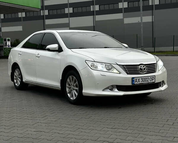 Білий Тойота Камрі, об'ємом двигуна 2.49 л та пробігом 233 тис. км за 12700 $, фото 13 на Automoto.ua