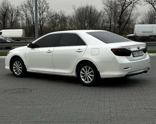 Білий Тойота Камрі, об'ємом двигуна 2.49 л та пробігом 233 тис. км за 12700 $, фото 2 на Automoto.ua