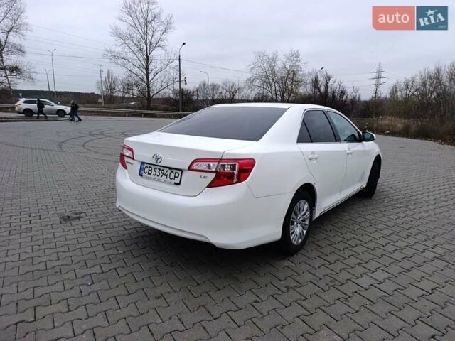 Белый Тойота Камри, объемом двигателя 2.49 л и пробегом 174 тыс. км за 9700 $, фото 5 на Automoto.ua