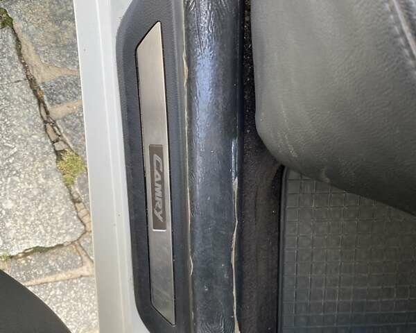 Белый Тойота Камри, объемом двигателя 2.36 л и пробегом 210 тыс. км за 12100 $, фото 15 на Automoto.ua