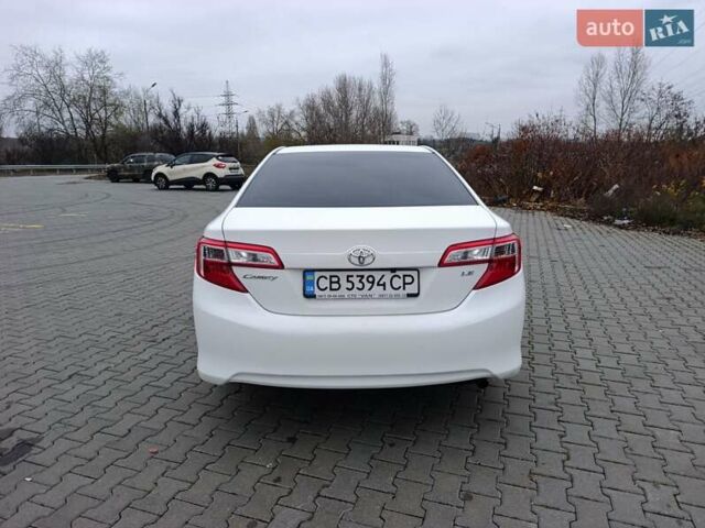 Белый Тойота Камри, объемом двигателя 2.49 л и пробегом 174 тыс. км за 9700 $, фото 3 на Automoto.ua