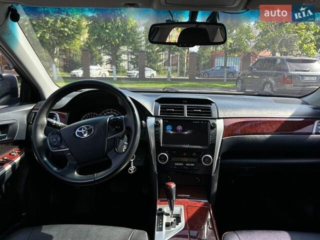 Белый Тойота Камри, объемом двигателя 2.5 л и пробегом 237 тыс. км за 11900 $, фото 21 на Automoto.ua