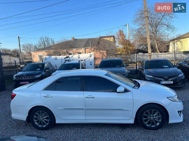 Белый Тойота Камри, объемом двигателя 2.5 л и пробегом 170 тыс. км за 11200 $, фото 7 на Automoto.ua