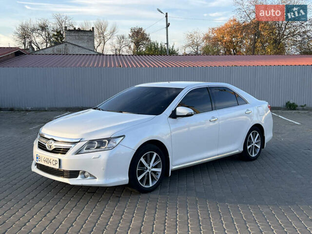 Тойота Камри 2012 в Козельщине на Automoto.ua Белый Тойота Камри, объемом двигателя 2.5 л и пробегом 182 тыс. км за 14000 $, фото 5 на Automoto.ua