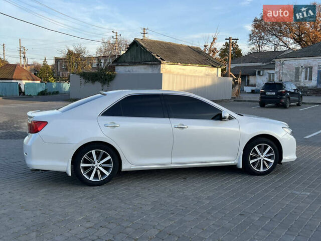 Тойота Камри 2012 в Козельщине на Automoto.ua Белый Тойота Камри, объемом двигателя 2.5 л и пробегом 182 тыс. км за 14000 $, фото 14 на Automoto.ua