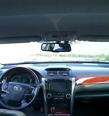 Белый Тойота Камри, объемом двигателя 2.5 л и пробегом 195 тыс. км за 11800 $, фото 5 на Automoto.ua