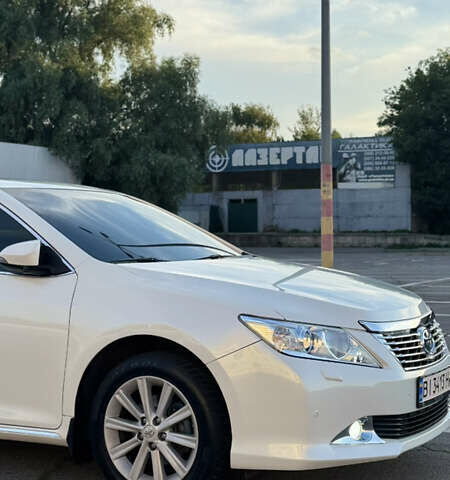 Белый Тойота Камри, объемом двигателя 2.5 л и пробегом 220 тыс. км за 14000 $, фото 4 на Automoto.ua