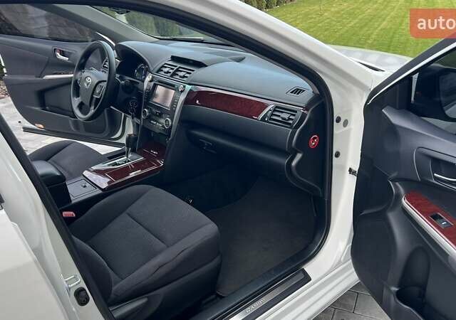 Білий Тойота Камрі, об'ємом двигуна 2.49 л та пробігом 135 тис. км за 13800 $, фото 20 на Automoto.ua