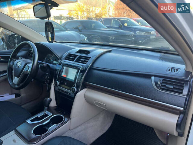 Белый Тойота Камри, объемом двигателя 2.5 л и пробегом 170 тыс. км за 11200 $, фото 15 на Automoto.ua