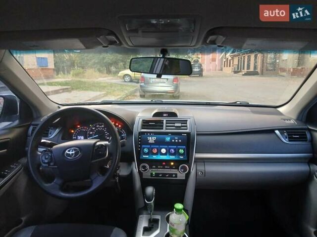 Білий Тойота Камрі, об'ємом двигуна 2.49 л та пробігом 250 тис. км за 10600 $, фото 4 на Automoto.ua