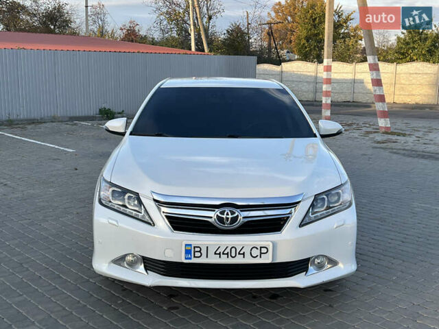 Тойота Камри 2012 в Козельщине на Automoto.ua Белый Тойота Камри, объемом двигателя 2.5 л и пробегом 182 тыс. км за 14000 $, фото 19 на Automoto.ua