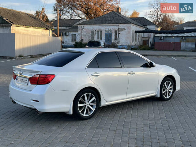 Тойота Камри 2012 в Козельщине на Automoto.ua Белый Тойота Камри, объемом двигателя 2.5 л и пробегом 182 тыс. км за 14000 $, фото 13 на Automoto.ua