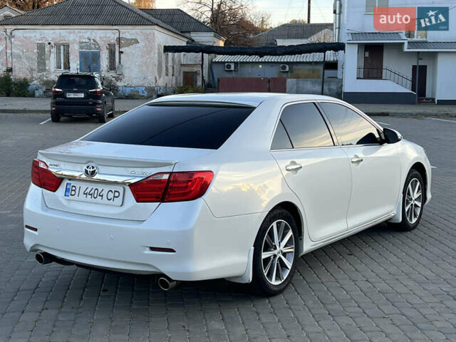 Тойота Камри 2012 в Козельщине на Automoto.ua Белый Тойота Камри, объемом двигателя 2.5 л и пробегом 182 тыс. км за 14000 $, фото 24 на Automoto.ua