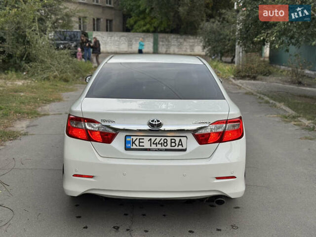 Белый Тойота Камри, объемом двигателя 2.5 л и пробегом 106 тыс. км за 12300 $, фото 5 на Automoto.ua