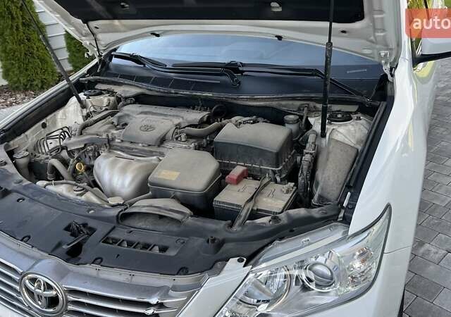Білий Тойота Камрі, об'ємом двигуна 2.49 л та пробігом 135 тис. км за 13800 $, фото 23 на Automoto.ua