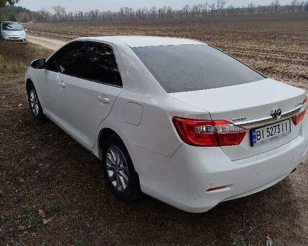 Білий Тойота Камрі, об'ємом двигуна 2.5 л та пробігом 196 тис. км за 11750 $, фото 8 на Automoto.ua