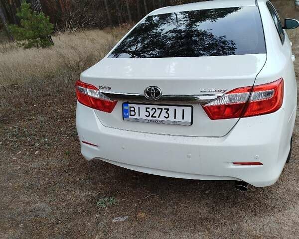 Білий Тойота Камрі, об'ємом двигуна 2.5 л та пробігом 196 тис. км за 11750 $, фото 13 на Automoto.ua