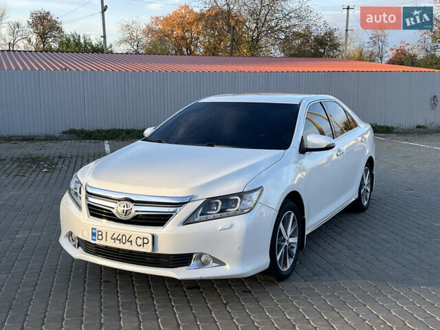 Тойота Камри 2012 в Козельщине на Automoto.ua Белый Тойота Камри, объемом двигателя 2.5 л и пробегом 182 тыс. км за 14000 $, фото 4 на Automoto.ua