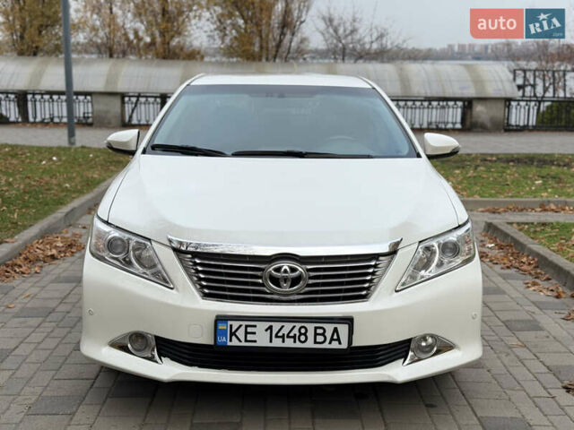 Белый Тойота Камри, объемом двигателя 2.49 л и пробегом 106 тыс. км за 12700 $, фото 2 на Automoto.ua