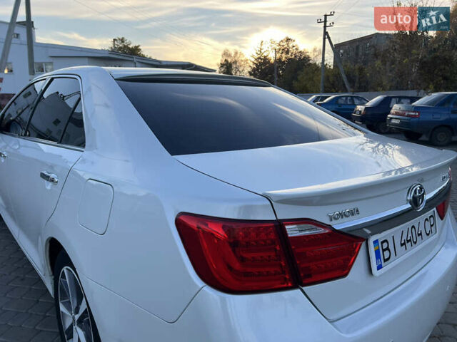 Тойота Камри 2012 в Козельщине на Automoto.ua Белый Тойота Камри, объемом двигателя 2.5 л и пробегом 182 тыс. км за 14000 $, фото 36 на Automoto.ua