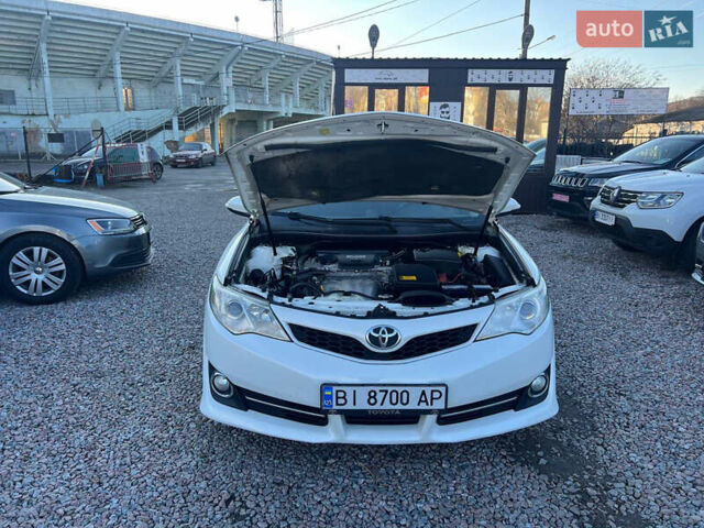 Белый Тойота Камри, объемом двигателя 2.5 л и пробегом 170 тыс. км за 11200 $, фото 18 на Automoto.ua