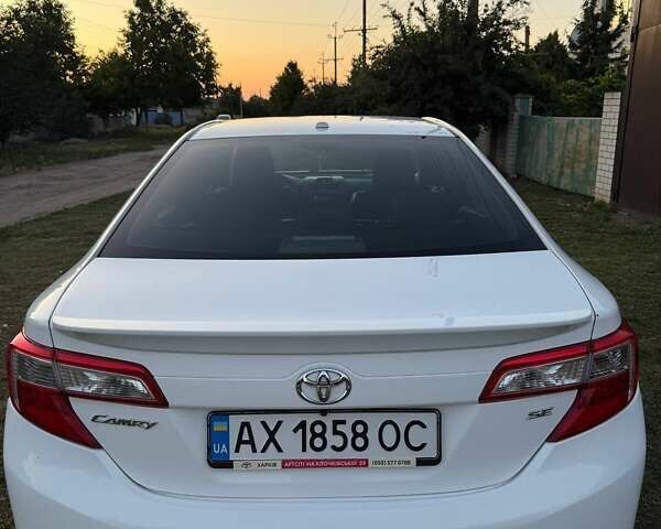 Белый Тойота Камри, объемом двигателя 2.49 л и пробегом 178 тыс. км за 10700 $, фото 10 на Automoto.ua