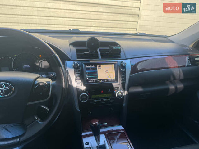 Белый Тойота Камри, объемом двигателя 2.49 л и пробегом 162 тыс. км за 15500 $, фото 15 на Automoto.ua